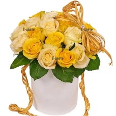 Yellow and white roses in box