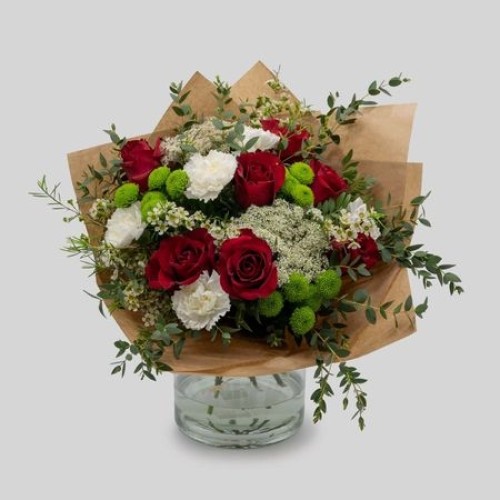 Bouquet of roses in greenery